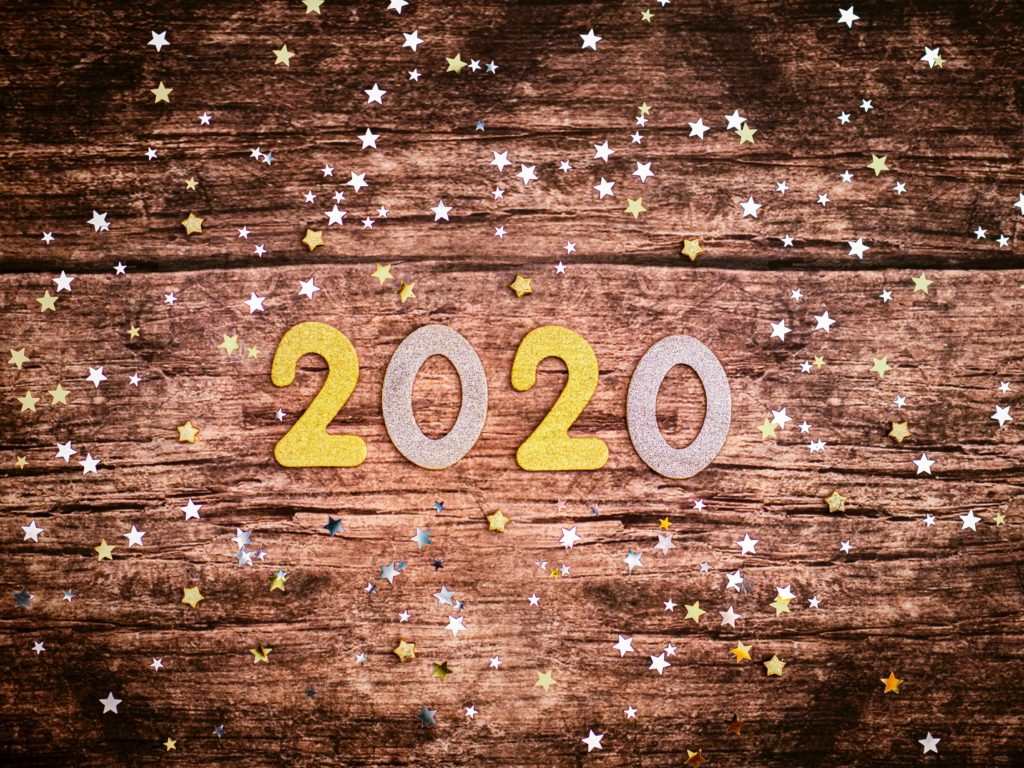 2020 and graffiti on wood background